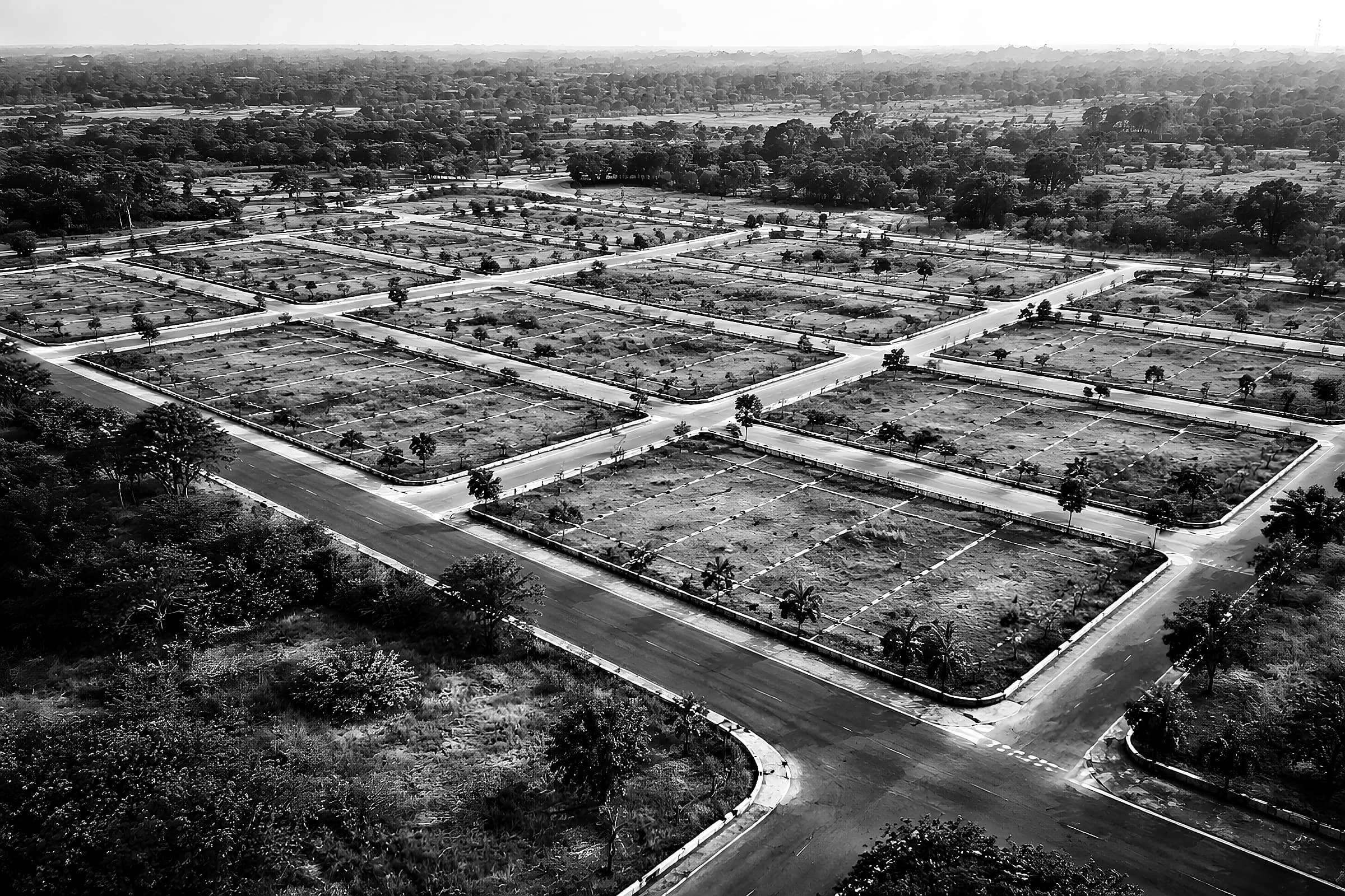 Aerial view of a plotted layout with new roads, outside Chennai